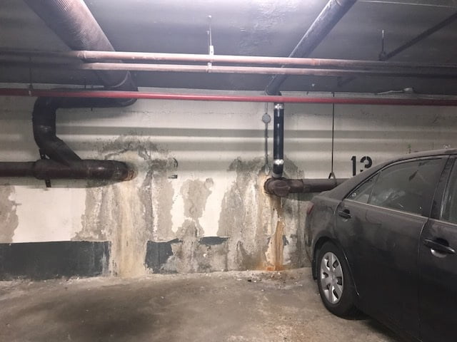 Crystalline waterproofing applied to a concrete structure